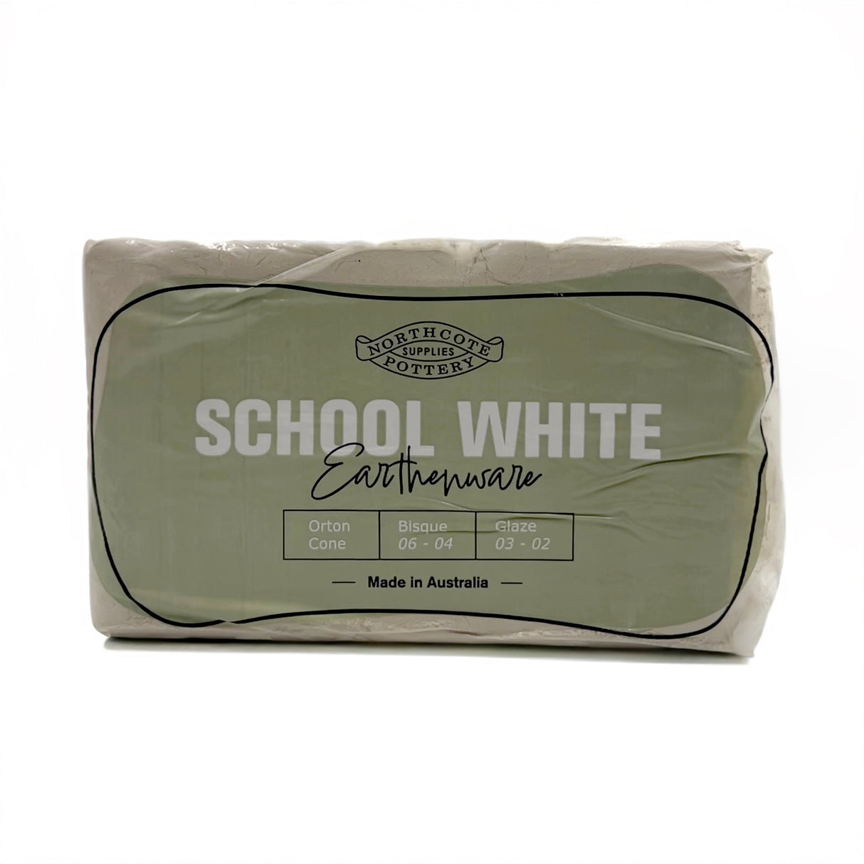 Wrapped block of Northcote Pottery Supplies School White Earthenware clay in sage green plastic packaging. Label displays Orton Cone, Bisque 06-04, Glaze 03-02 specifications and Made in Australia text. White earthenware clay suitable for pottery and ceramics projects in educational settings.