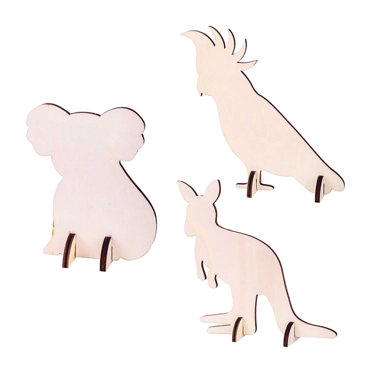 The plain wooden shapes from Zart Wooden Standing Australian Animals, laser-cut in natural unpainted plywood: a sitting koala, a crested cockatoo, and a kangaroo, each with slotted wooden feet fitted at the base so they stand upright, ready to be painted or decorated.