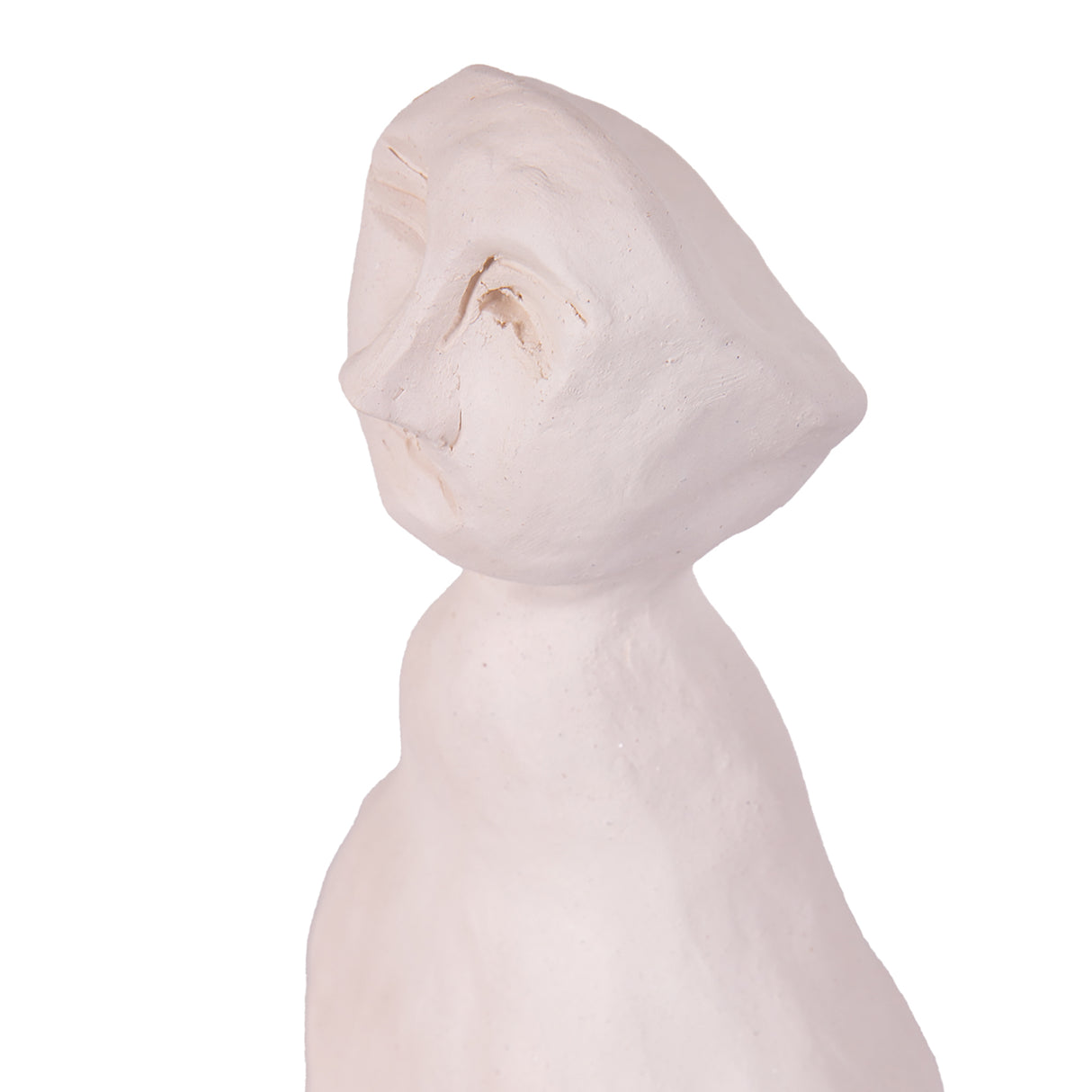 Handcrafted clay sculpture of a simplified human figure in profile, showing a rounded head with carved facial features and smooth body form. The pale stoneware demonstrates Northcote clay's excellent modeling and carving properties, with visible texture and tool marks that highlight the medium's workability for sculptural projects.