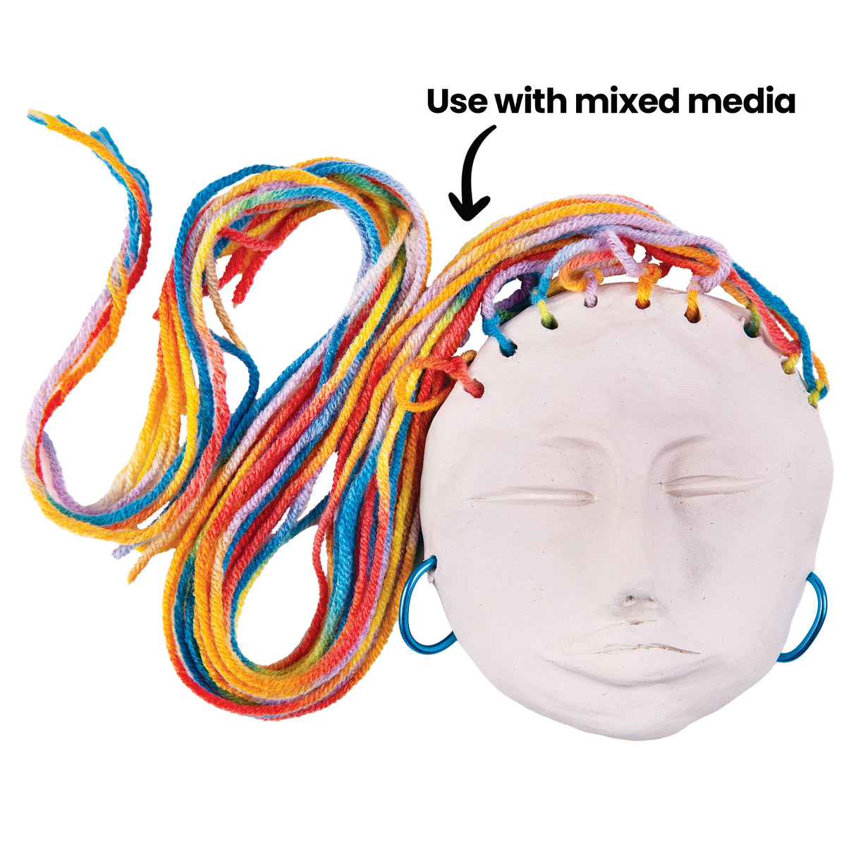 White clay face mask with sculpted features displayed alongside vibrant multicoloured twisted yarn strands in blue, yellow, red, pink, and green. The yarn is threaded through holes around the mask's edge as decorative hair. Text reads "Use with mixed media" with an arrow pointing to the completed example.