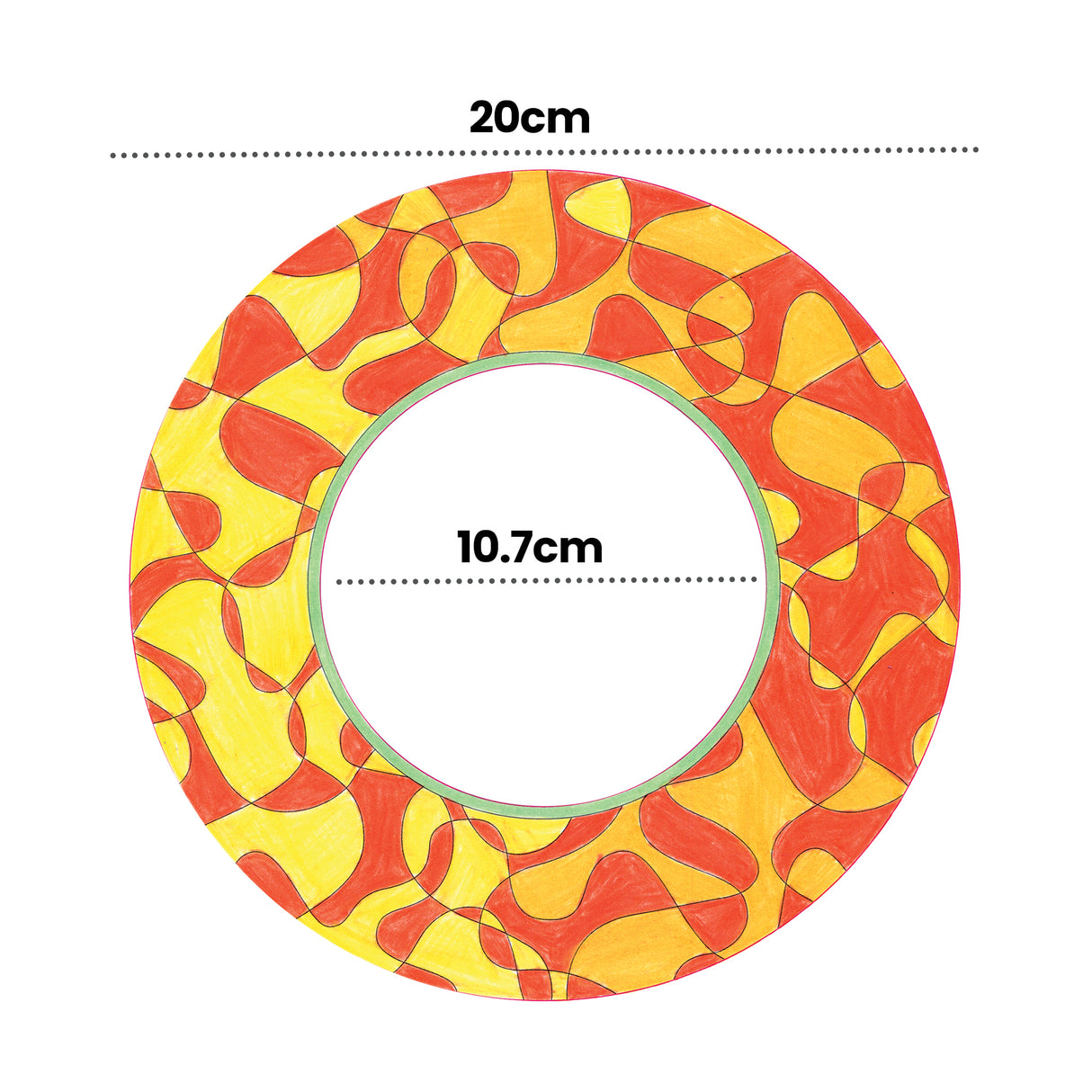 A hand-coloured sample made using a Zart ColourMe Wreath, filled in with a swirling orange and yellow pattern and a green-outlined centre ring. Dimension labels mark the wreath at 20cm outer diameter with a 10.7cm centre cut-out.