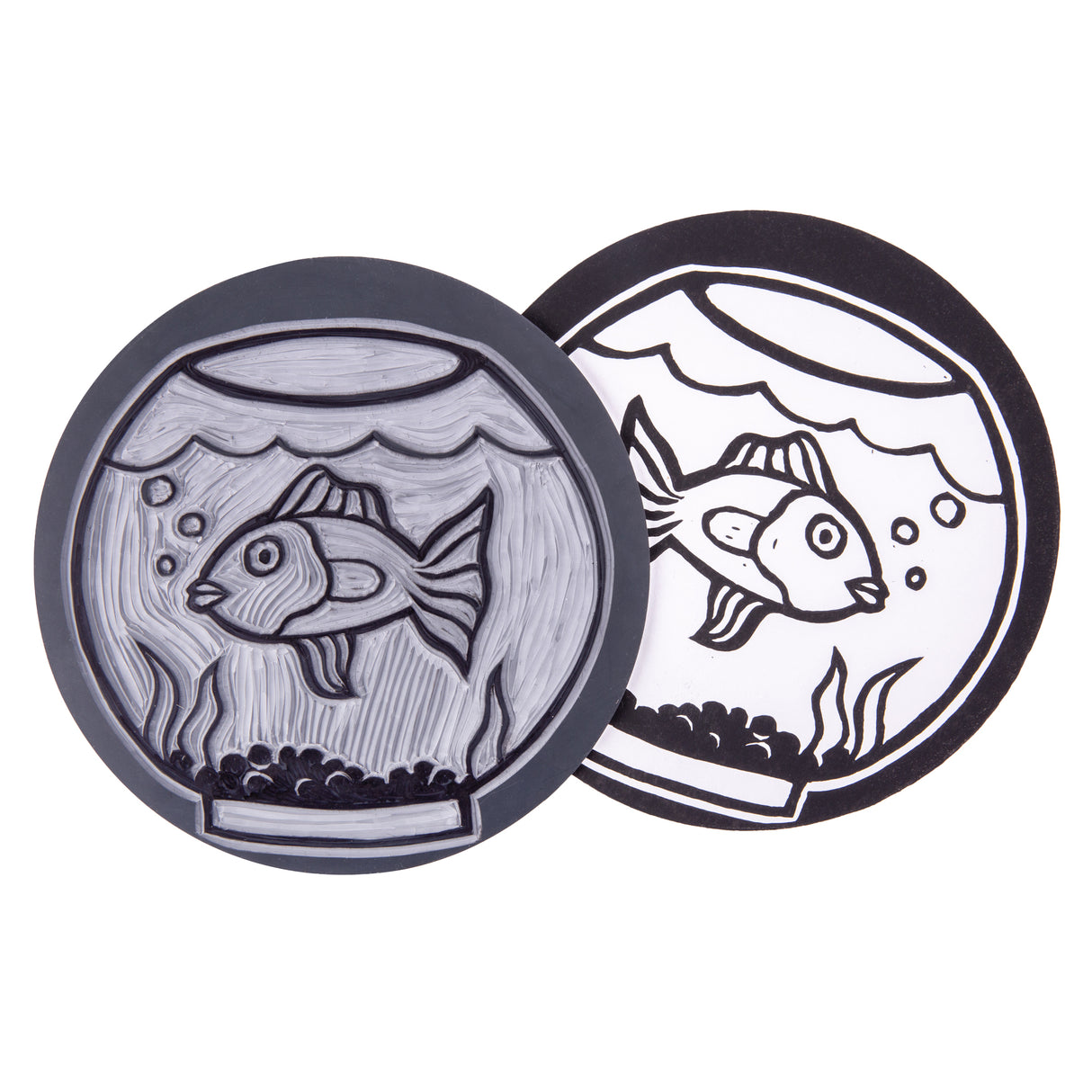 Two Mastercut Print Lino Round blocks shown with a carved fishbowl design. One block displays the completed carved lino surface, while the other shows the bold black printed result on white paper. The round format highlights how designs transfer cleanly during printing.