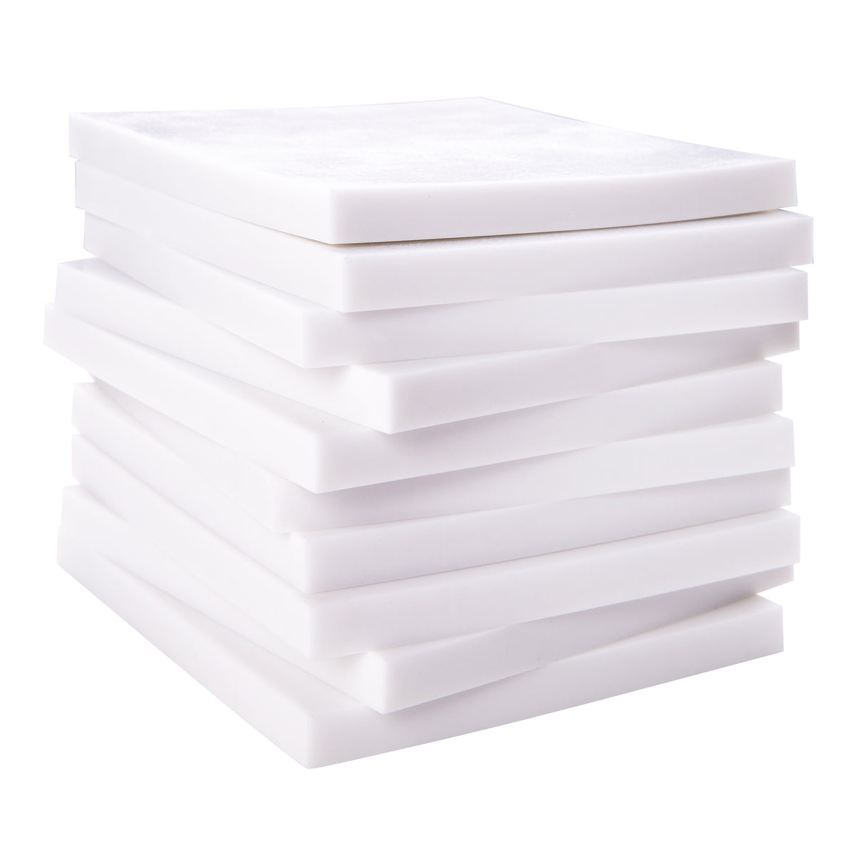 Stack of multiple white soft cut carving blocks arranged neatly in a pile. Each block has uniform thickness with smooth, straight edges. The matte white surfaces appear even and consistent against a plain white background.