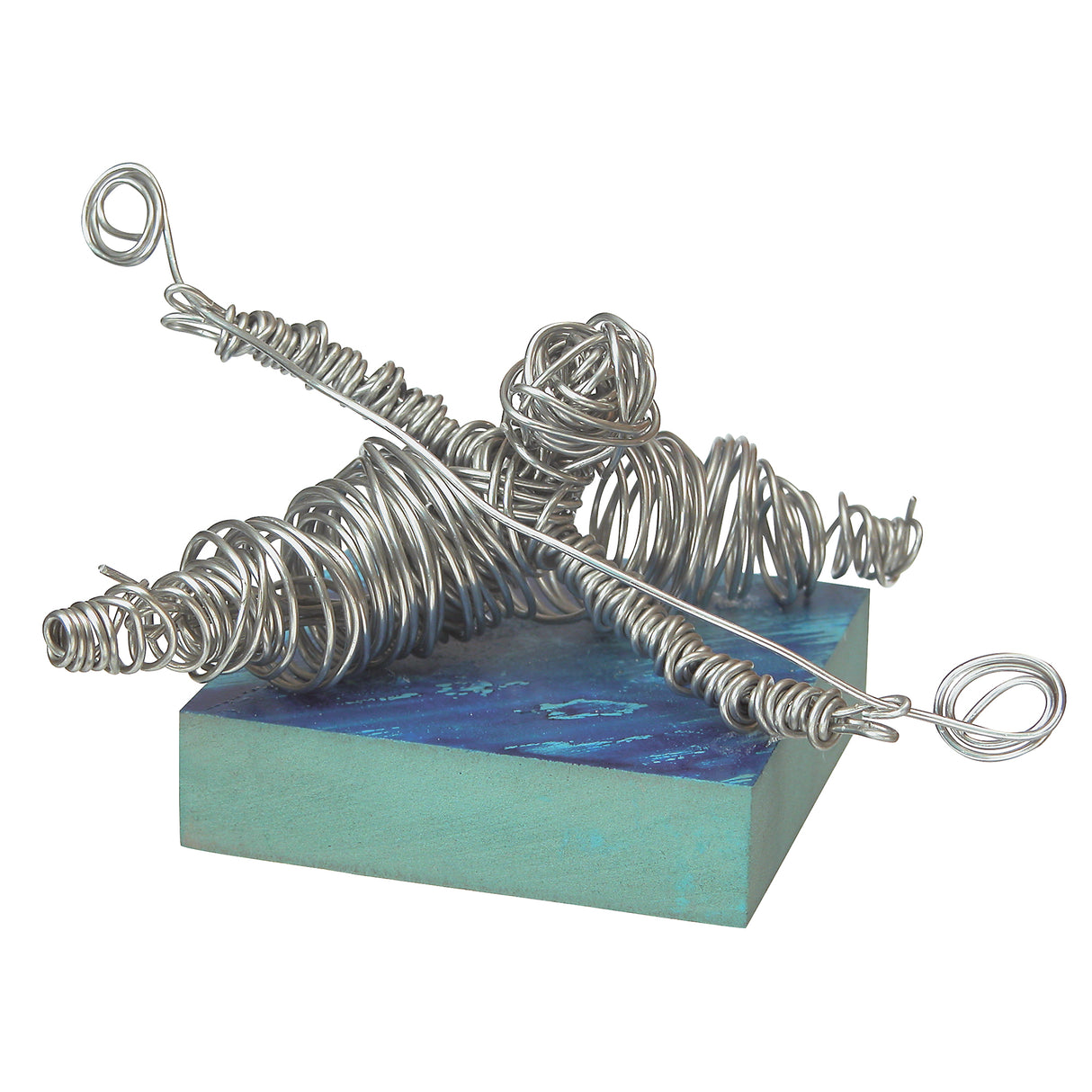 Finished abstract sculpture created from Armature Wire, tightly coiled and wrapped to form a reclining figure mounted on a painted rectangular base. The silver wire construction showcases strength, structure and suitability for three-dimensional modelling.