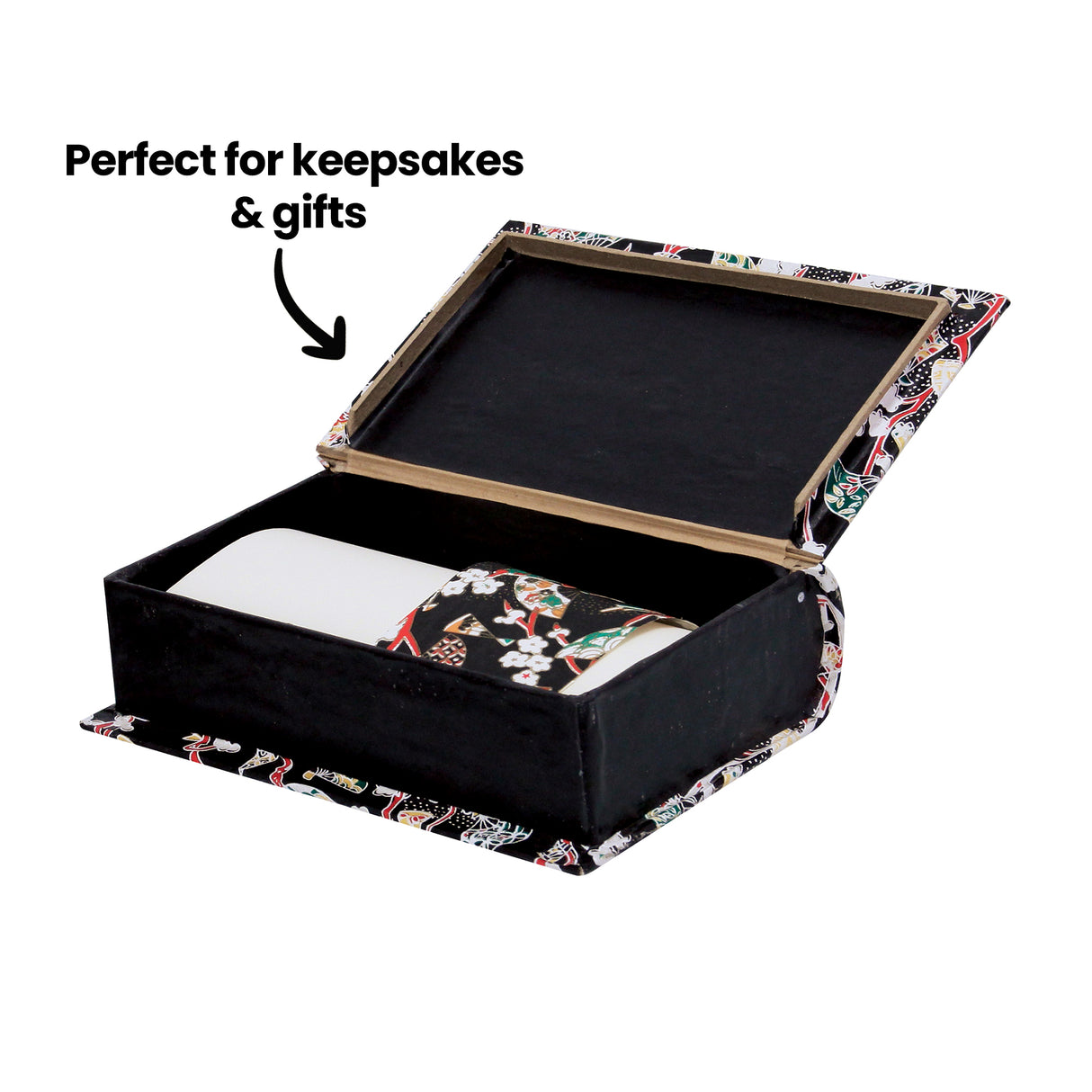 An open, painted black Zart Papier-mache Book box lined with a black interior, decorated on the outer cover and spine with a floral Japanese-style patterned paper in red, green, and gold tones. A cream-coloured object sits inside. Labelled "Perfect for keepsakes & gifts".