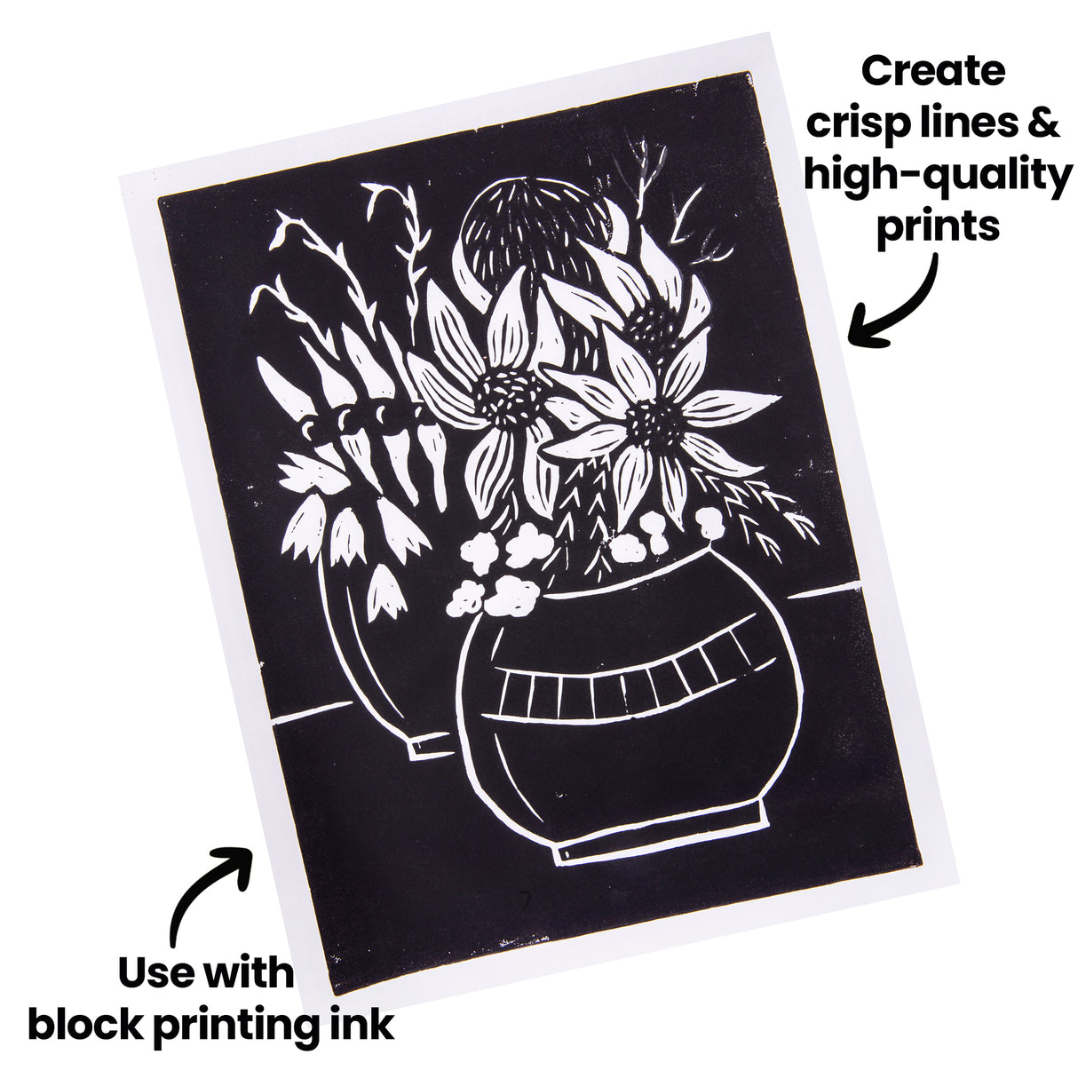 Black ink print of a floral still life, shown on white paper. Annotated text reads “Create crisp lines & high-quality prints” and “Use with block printing ink,” pointing to the clean white linework created by carving the Lino Tile Vinyl Double Sided.