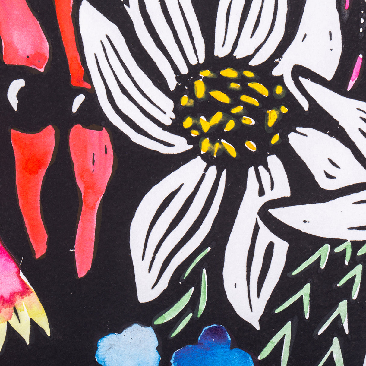 Close-up detail of the hand-coloured floral print, focusing on a large white flower with yellow centre. Watercolour washes in red, green and blue sit over the black ink print, highlighting carved line details and contrast.