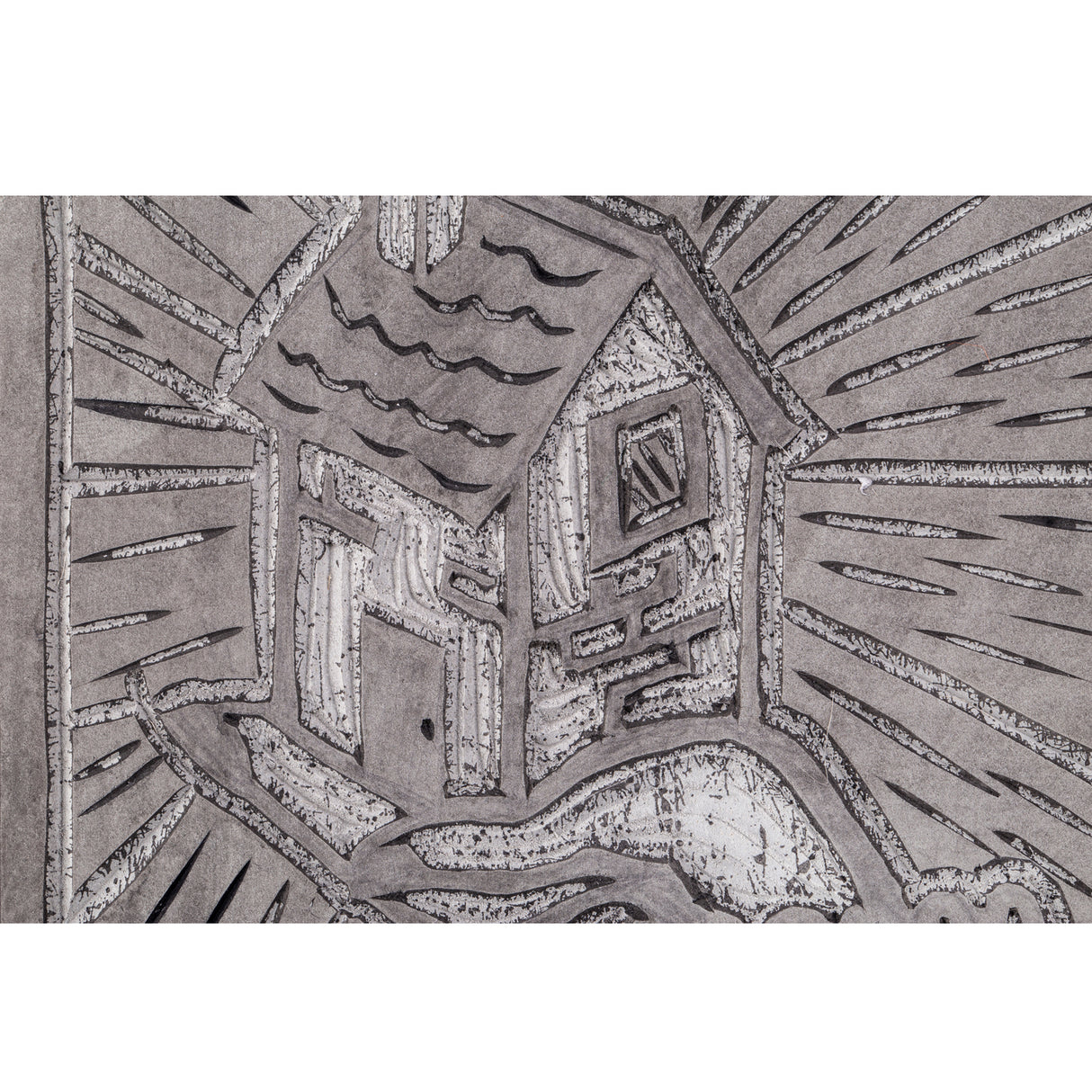 Detailed close-up of a carved Silk Cut Lino Tile featuring a small house design. The surface shows incised outlines, textured shading and varied line weight, demonstrating how the lino holds both fine detail and bold shapes.