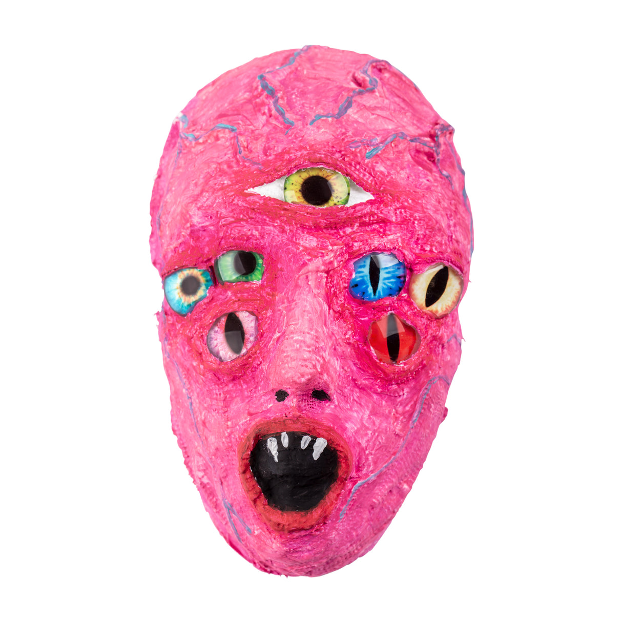 Papier-mâché mask in vibrant pink with textured surface featuring six Creature Eyes in various colours including yellow-green, blue, turquoise, pink, cream, and red. The sculptural piece displays an open mouth with white teeth and includes purple accent details throughout the textured pink surface.
