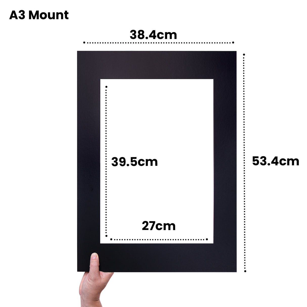 Black A3 mount held by hand showing dimensions: 38.4cm width, 53.4cm height, with a white rectangular window aperture measuring 27cm by 39.5cm. The pre-cut mount features a wide black border designed to frame and display artwork professionally.