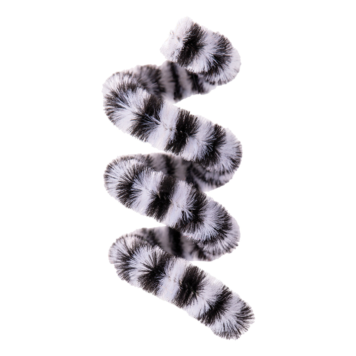 Fluffy chenille stem twisted into a spiral shape, featuring soft white fibres with black striped pattern resembling zebra or tiger markings, shown against a plain white background displaying the texture and flexibility of the craft material.