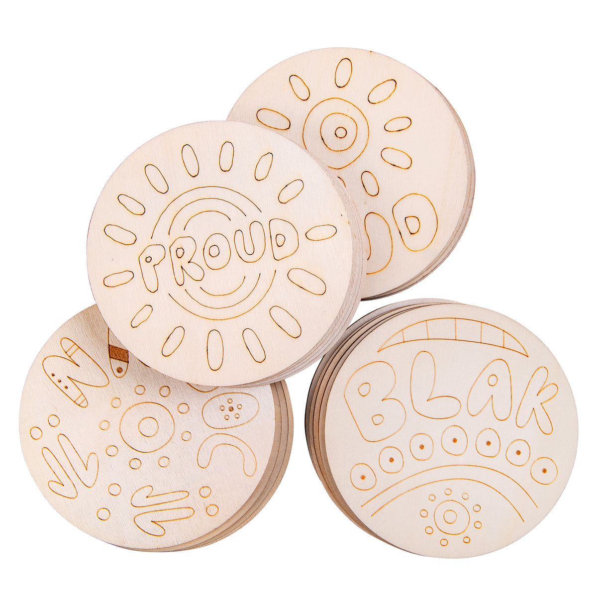 Four stacks of round wooden coasters in natural plywood featuring laser-engraved Indigenous Australian designs. Visible text includes PROUD and BLAK incorporated into decorative patterns with circles, dots, sun motifs, and organic shapes. Each coaster showcases a unique contemporary Aboriginal-inspired design with fine engraved lines creating textured imagery on smooth wooden surfaces.