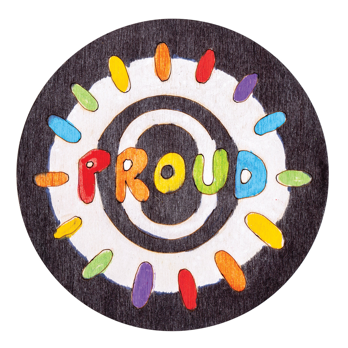 Circular wooden coaster with dark stained background featuring white concentric rings. The word PROUD is hand-drawn in vibrant rainbow colours across the centre, surrounded by colourful oval shapes creating a decorative border pattern. The design celebrates NAIDOC themes with cheerful, inclusive artwork by Jo Wilson.