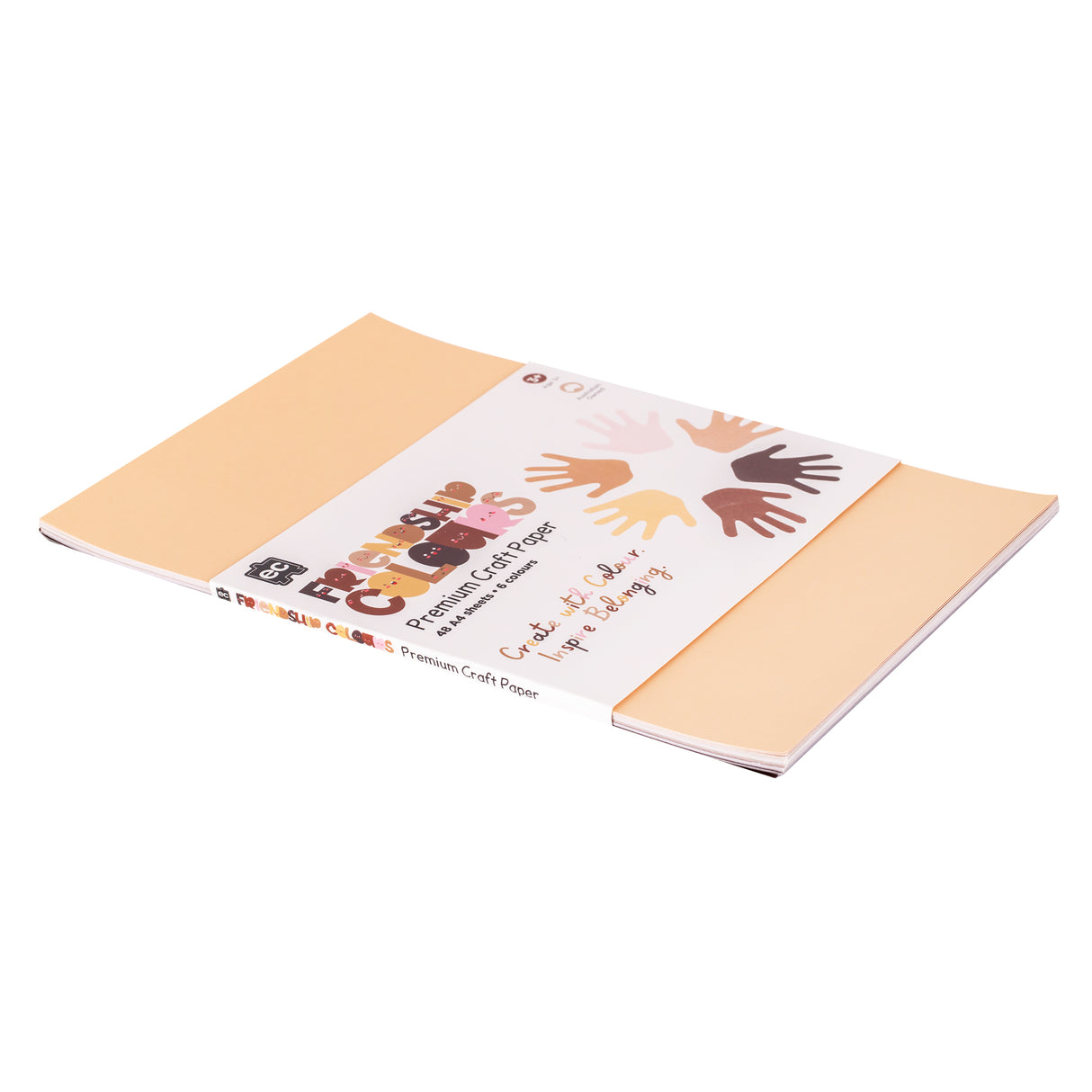 Stack of peach-coloured A4 craft paper with product band displaying diverse handprints in various skin tones. The Friendship Colour Premium Craft Paper packaging features text reading "Be Kind. Be You. Be Helpful. Curious. Kind. Brave. Happy & Silly." Premium quality paper suitable for multicultural and inclusive classroom activities.