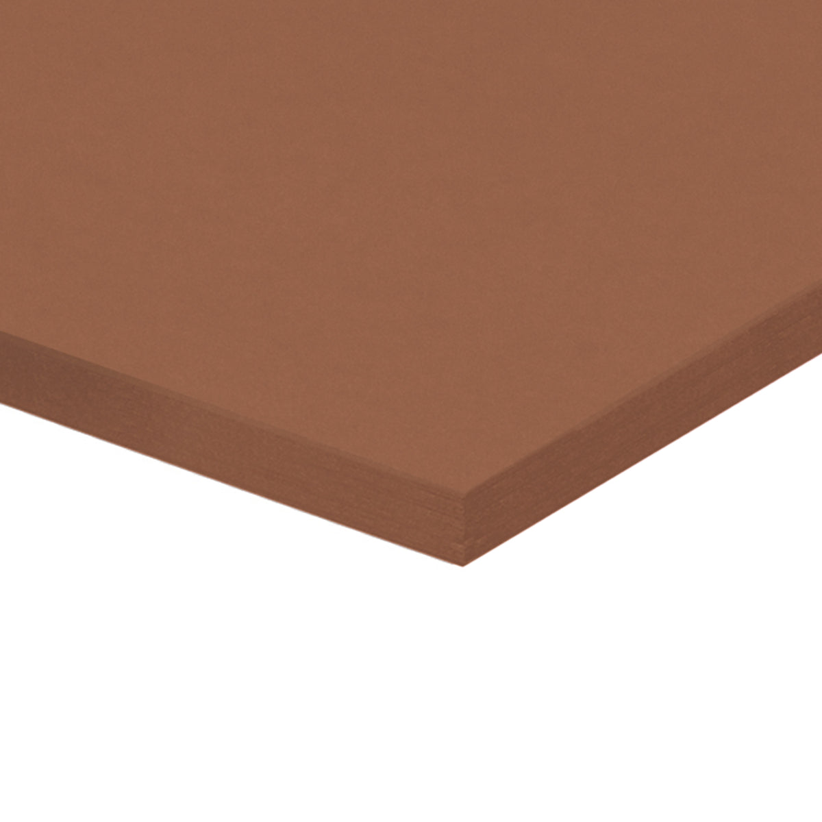 A corner of a stack of brown Zart Cover Paper shown at an angle against a white background. The top sheet has a smooth, even surface, and the layered edge reveals the depth of the pack with its neatly aligned sheets.