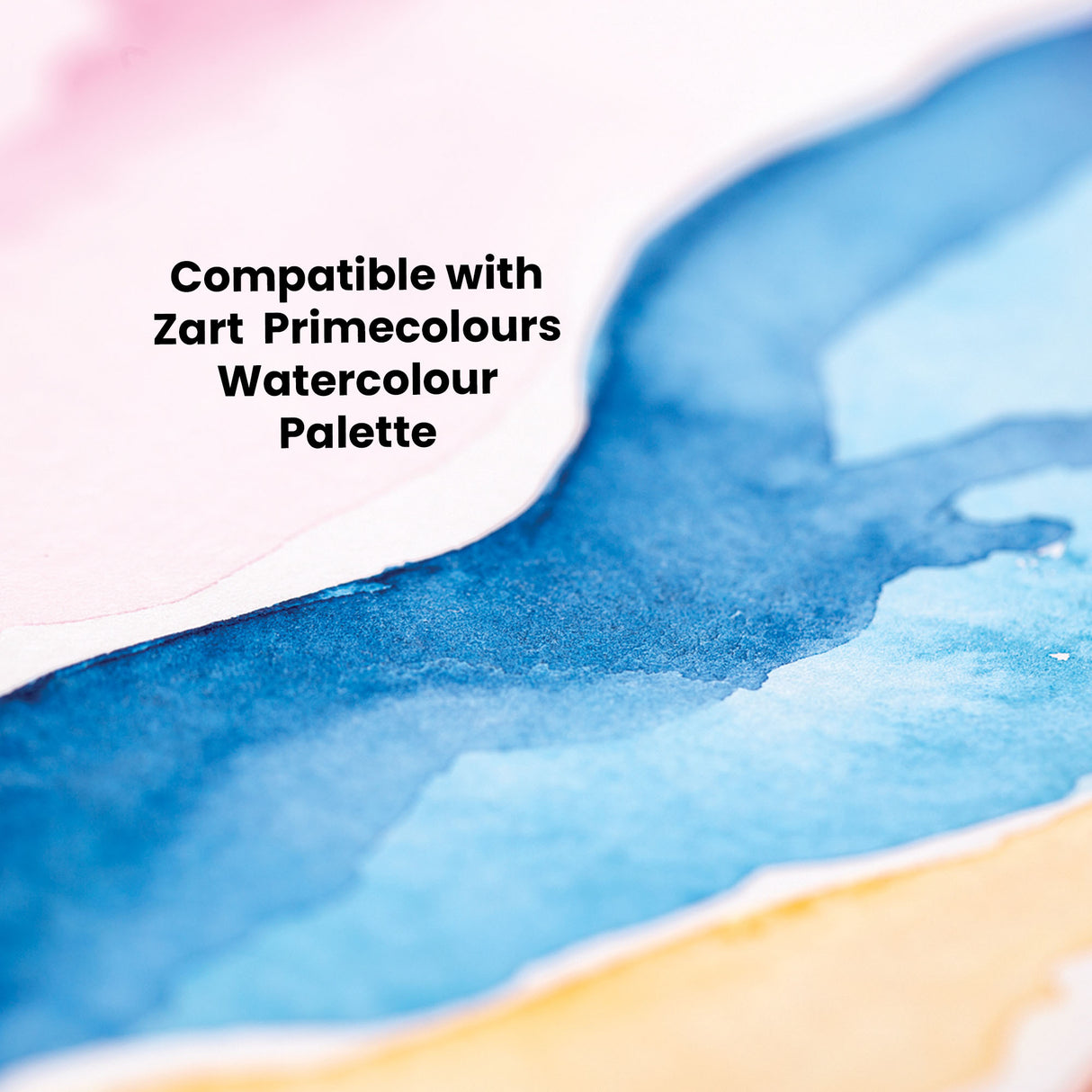 Watercolour painting demonstrating vibrant blue brushstrokes blending from deep navy to soft sky blue with touches of pink and yellow on textured white paper. Text reads: Compatible with Zart Primecolours Watercolour Palette.