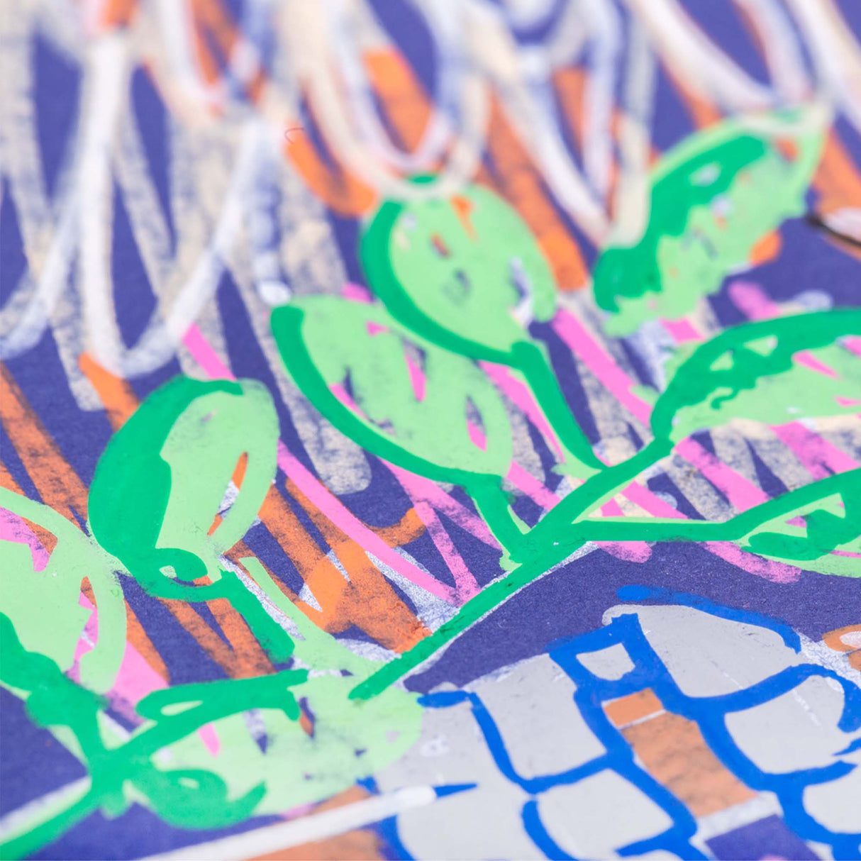 Macro detail of POSCA marker artwork showing bright green leaves layered over textured strokes of orange, pink, white and blue on dark paper.