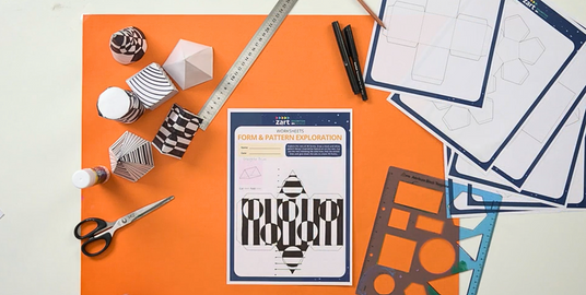 Zart Education On Demand Form and Pattern Worksheet Activity Outcome Overhead view of a Zart Education Form & Pattern Exploration worksheet activity. The workspace features black-and-white geometric paper models, scissors, glue stick, rulers, pens, and printed template sheets arranged on a bright orange background. The worksheet in the centre shows an optical pattern design for constructing 3D paper forms, illustrating a hands-on art and design classroom activity.