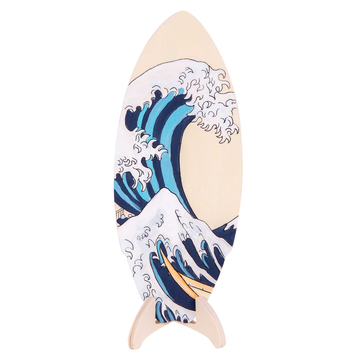 Student-painted surfboard-shaped plywood artwork displayed upright on a wooden stand. The painting depicts a version of Hokusai’s The Great Wave, with stylised blue waves and white foam on the pale timber surface.