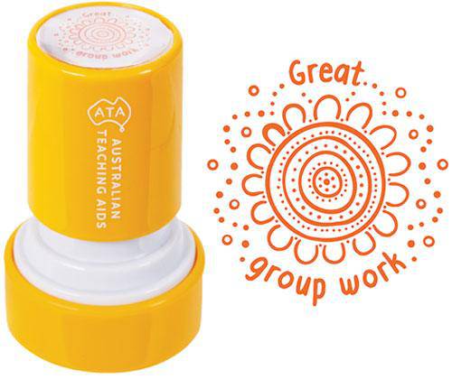 Bright yellow self-inking stamp showing the Country Connections Stamps branding, displayed alongside a sample artwork print featuring a decorative circular sun design with radiating petals and dots, surrounded by orange dotted accents and handwritten text reading "Great" and "group work".
