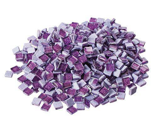 A pile of small square glitter glass mosaic tiles in varying shades of purple and lavender, featuring a sparkly, glittery finish. The tiles are approximately 1cm square with bevelled edges, creating a shimmering effect across the mixed purple tones from deep violet to pale lilac.