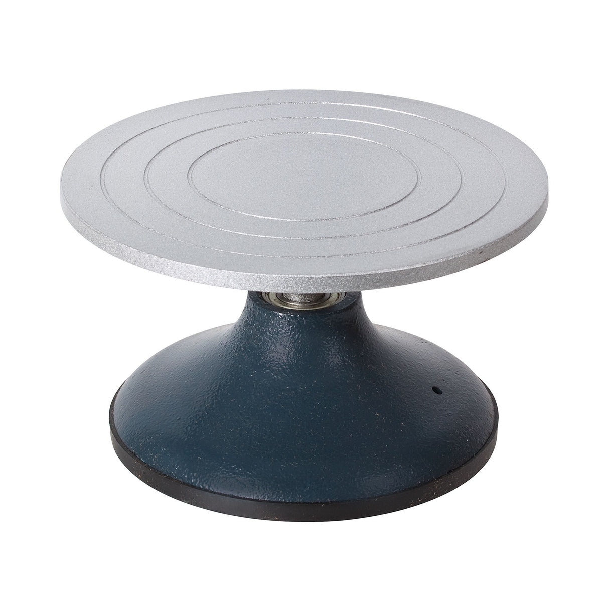 Pottery turning wheel with light grey circular steel top featuring concentric guide rings for centring work, mounted on a dark teal weighted base with ball-bearing mechanism for smooth 360-degree rotation, ideal for hand-building, decorating and sculpting ceramic projects.