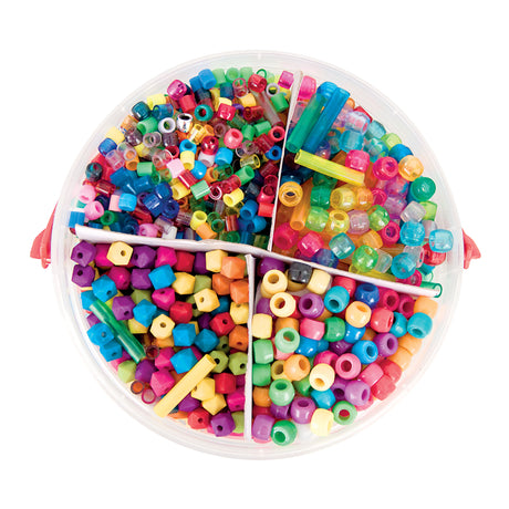 Zart Basics plastic beads viewed from above in a round tub divided into four wedge-shaped compartments. Each section holds a different assortment — translucent and opaque pony beads, faceted cube beads, and short tube beads — in a bright mix of pink, blue, green, yellow, purple and orange.