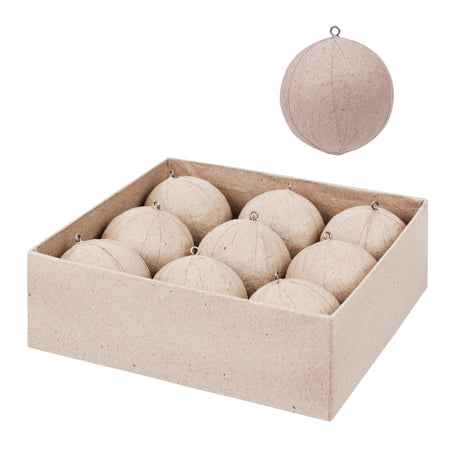 A close-up of an unpainted Zart Papier-mache Bauble in natural kraft brown, with a metal hanging loop and faint vertical seam lines across its surface. Below, an open box holds nine identical blank baubles arranged in three rows, each fitted with the same wire hanging loop.