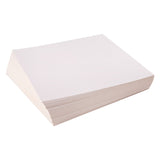 A pack of Zart Card Squares White stacked in a loose pile at an angle against a white background. The smooth white top surface and off-white edges of the thick card stack are clearly visible, showing the substantial weight of the 300gsm stock.