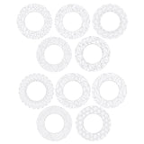 Ten circular Zart ColourMe Wreath shapes in plain white ivory board, each pre-printed with a different black outline pattern — including florals, mandalas, geometric shapes, feathers, scallops and swirling lines. The centre cut-out and blank patterned border show the wreaths ready for colouring.