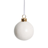 A plain white Zart Ceramic Bauble with a glossy finish and gold cap fitting. A white ribbon loop extends from the top for hanging. The smooth, undecorated surface shows the bauble ready for painting, giving a clear view of the blank base shape.