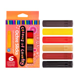 Zart Colours of Country Ochre Slicks packaging shown beside all six sticks laid flat, in dark brown, yellow, red, tan, dark red and black. The peach box has a rainbow-striped top band, dot-art lettering, a cut-out window revealing stacked colours inside, and a single yellow stick pictured at left.
