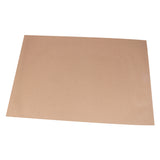 A single sheet of brown kraft card displayed at an angle on a white background, showing its smooth, natural texture and warm tan colour. The heavyweight 180gsm cardstock has a matte finish with subtle flecking, suitable for creating portfolio bags or protecting artwork.