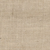 A close-up of natural hessian fabric filling the entire frame. The open-weave structure is clearly visible, showing the coarse interlocked fibres in a warm tan and cream tone. The texture is uneven across the surface, with natural variation in the weave throughout.