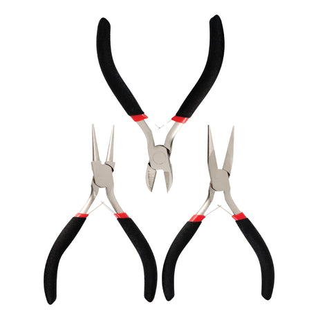 The Zart Jewellery Plier Set of three, shown open against a white background. Each has black foam-cushioned handles with red bands near the metal joint. The trio includes round nose pliers, diagonal side cutters and long flat nose pliers with tapered stainless steel jaws.