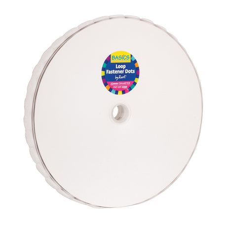 Large white roll of Basics Loop Fastener Dots by Zart, shown from above with a central cardboard core and smooth layered edges. The circular roll appears thick and uniform, with a clean matte surface and visible stacked dot layers around the perimeter