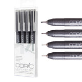 Copic Multiliner Set in Cool Gray, shown alongside four individual pens fanned horizontally. The clear plastic packaging displays the Copic logo and "Multiliner Set Cool Gray" labelling. Each pen features a dark grey speckled barrel with a fine metal nib and light grey cap.