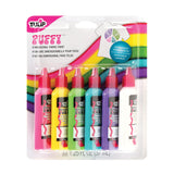 Tulip Puffy Dimensional Fabric Paint packaging, a blister pack displaying six upright squeeze bottles with red nozzle caps, in pink, yellow, lime, turquoise, purple and white. The card backing features a rainbow stripe design, a white t-shirt graphic decorated with coloured sections, and a blue “Permanent, Washable” badge.