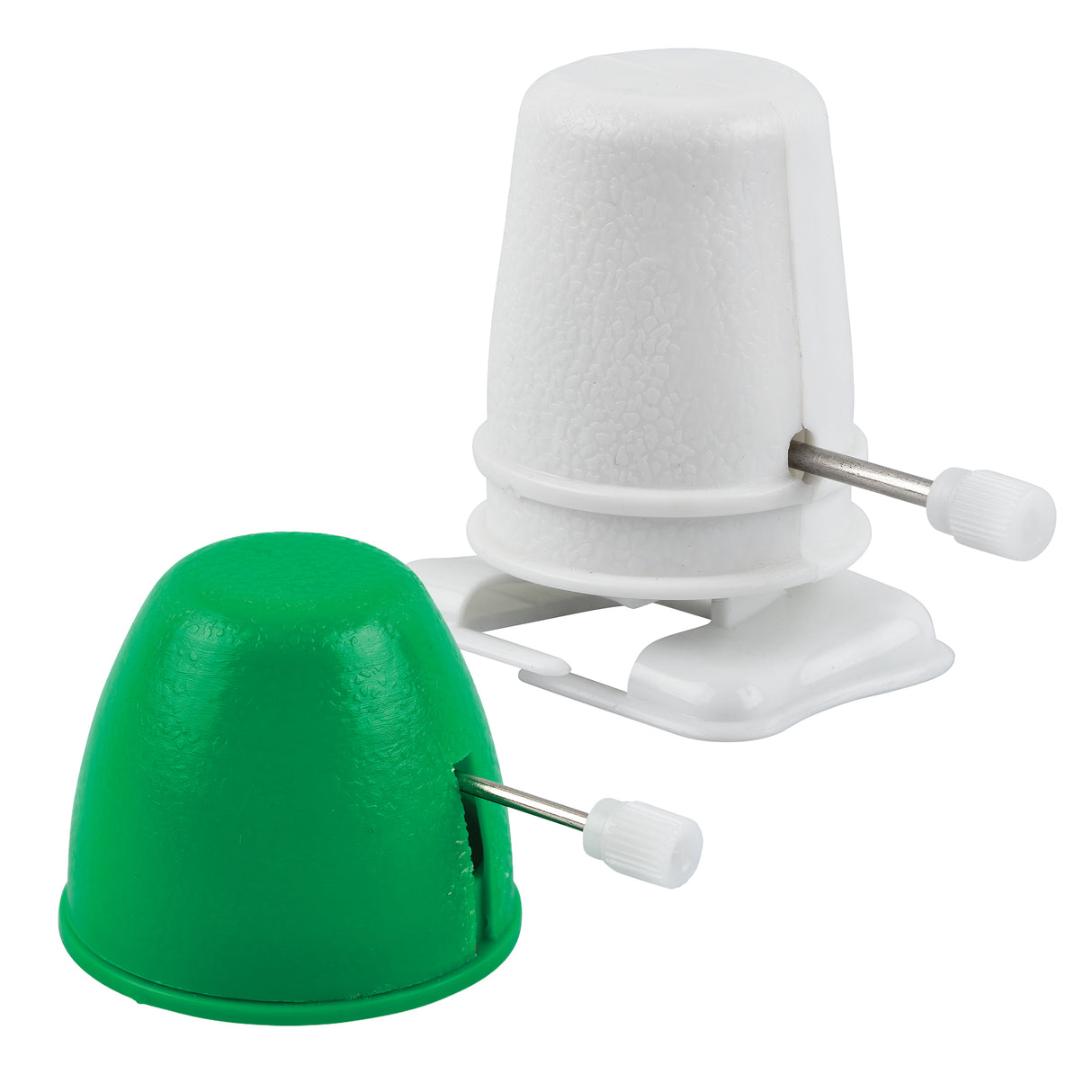 White and green plastic wind-up walking mechanisms are shown against a plain background. Each has a rounded foam-textured dome casing, a small side crank handle, and a flat base with simple moving feet components visible beneath the body.