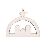 The plain wooden shape of a Zart Wooden Nativity Hanger, laser-cut in natural unpainted plywood. An arched stable silhouette with a star and hanging hole above, and cut-out figures of Mary, Joseph and baby Jesus visible as negative space within the open centre.