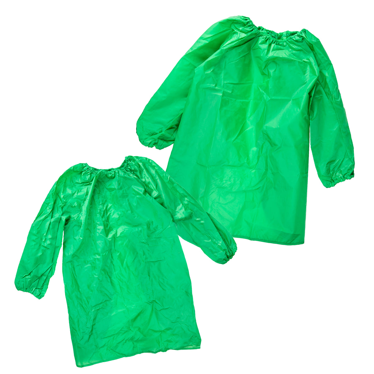 Two green Zart smocks laid out together, a smaller one in front and a larger one behind, showing the size difference between them. Both share the same elasticated round neckline, long sleeves with elasticated cuffs, and a curved, uneven hemline dipping lower at the centre front.