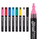 Set of Zart Street Paint Markers in eight assorted colours, arranged in a row. One pink marker is shown uncapped on the right to display the textured 4mm bullet nib.