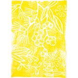 Bright yellow print made from a foam plate featuring botanical forms including leaves, seed pods and stylised flowers. The white etched areas create crisp outlines and negative space against the textured yellow ink. The composition fills the page with overlapping plant shapes and speckled print texture.