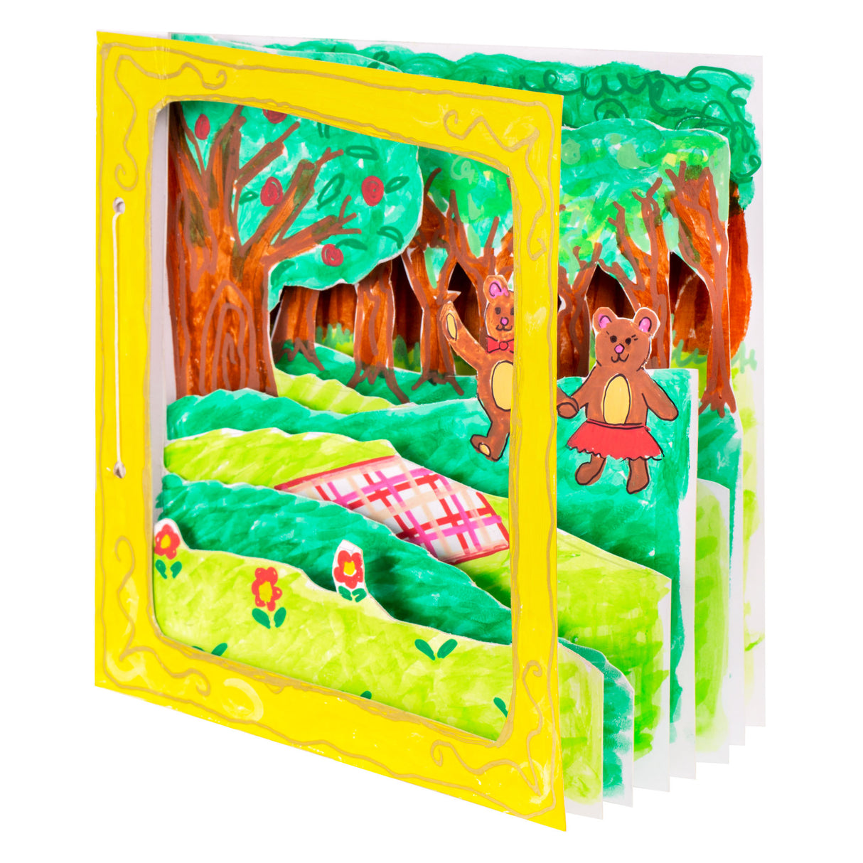 A sample artwork 3D diorama book made using Zart Card Squares White. Multiple layered card panels are painted in green and brown to create a forest scene with bear characters and a picnic rug. A yellow card outer frame with gold decorative border faces the viewer.
