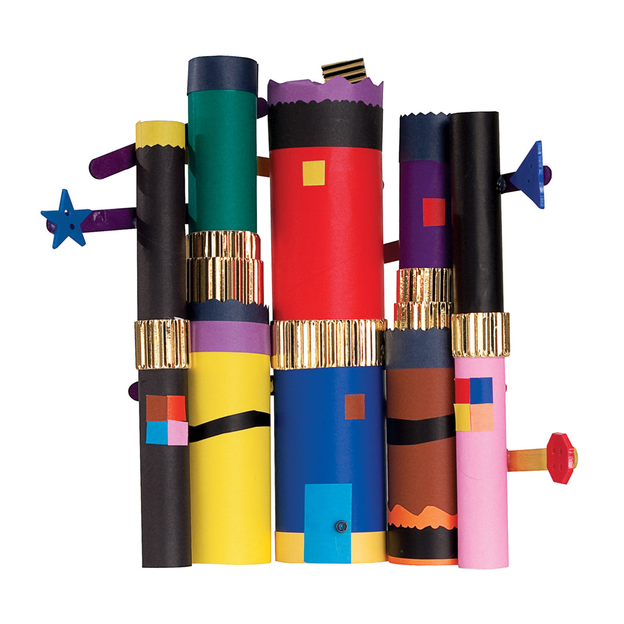 A group of colourful cylindrical cardboard tube artworks stand upright against a pale grey background. The tubes are decorated with bold blocks of colour including black, red, blue, yellow, purple and pink, with metallic gold corrugated bands, scalloped edges, geometric shapes and protruding decorative attachments.
