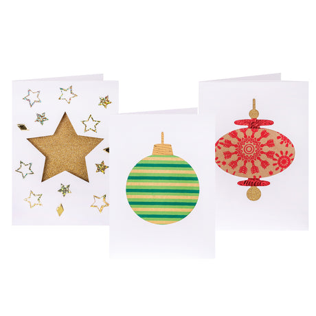 Three decorated samples made using Zart Cards and Envelopes Xmas Cut-Outs cards. A gold glitter star surrounded by scattered star and diamond sequins, a green-and-gold striped round bauble, and a red snowflake-patterned finial bauble on kraft paper show through each die-cut window.