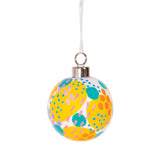A decorated sample made using a Zart Ceramic Bauble, painted with overlapping circles in yellow, teal, purple and orange, each dotted or dashed in contrasting colours. The playful abstract pattern covers the white base, finished with a silver cap and white ribbon loop.