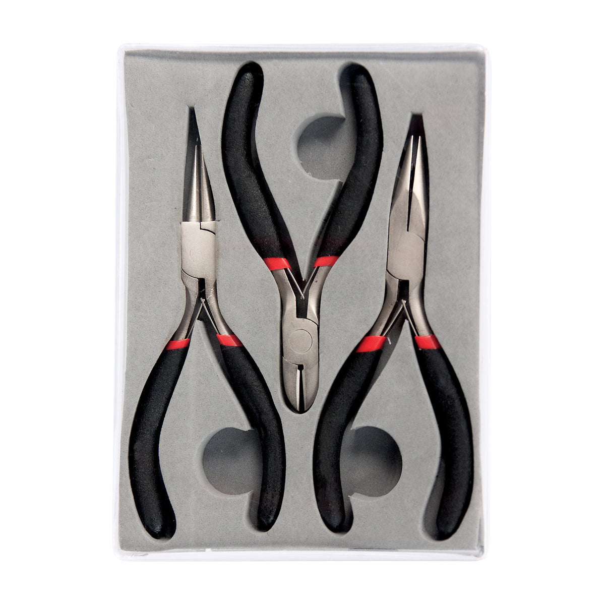 The Zart Jewellery Plier Set of three presented in a grey moulded tray inside a clear plastic case. All three pairs have black foam grips with red bands, arranged with jaws upward — round nose, flat nose and a central pair of diagonal cutters.