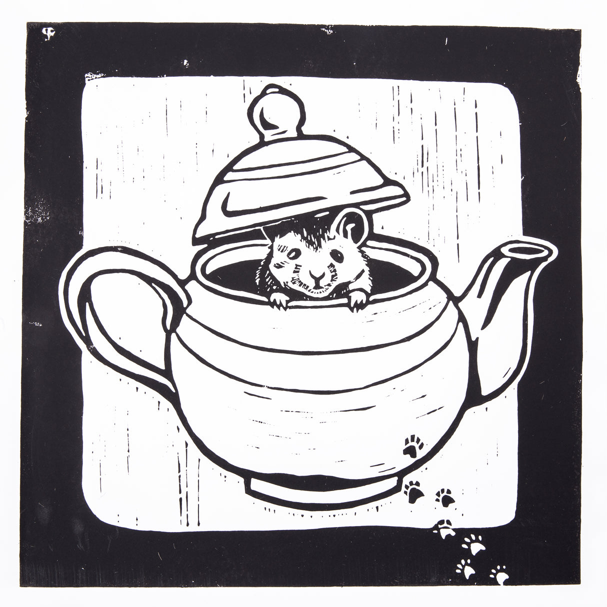 Black and white lino print depicting a mouse peeking out from inside a teapot with the lid raised. Bold black outlines define the form, while vertical carved lines create background texture. Small paw prints appear in the lower right corner.