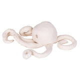 Hand-sculpted white clay octopus with rounded body and curling tentacles, showing slight surface cracking and texture, demonstrating the material’s ability to hold organic, hand-formed shapes.